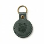 Full grain leather airtag holder keychain eden green in genuine full-grain cowhide with a clean unprinted finish