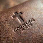 CGU-EYE-BROWN full-grain leather texture and debossed verse close-up