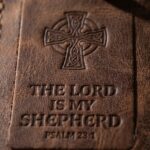 CGU-LUG-BROWN full-grain leather texture and debossed verse close-up