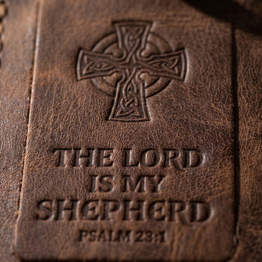 CGU-LUG-BROWN full-grain leather texture and debossed verse close-up