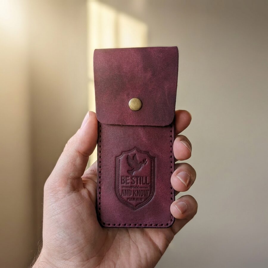 CGU-PEN-RED held in hand for scale