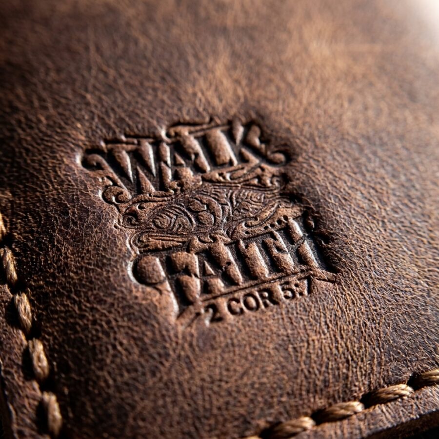 CGU-VCR-BROWN full-grain leather texture and debossed verse close-up